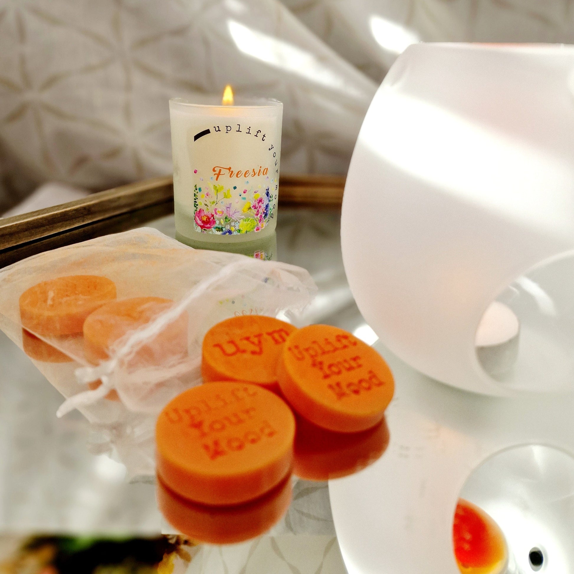 Highly scnted natural wax melts, freesia scent, orange colour, freesia candles